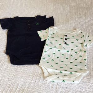 New in package 3-6 month dinosaur onesies